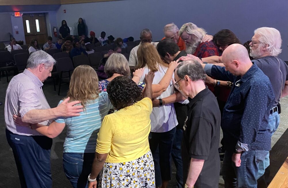 A group of people praying
